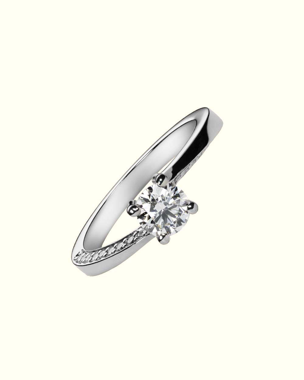 Essential solitaire ring with side diamonds