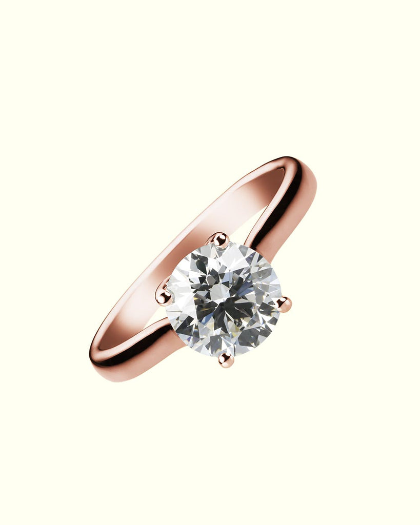 Luce cross band solitaire ring