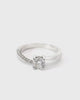 Essential solitaire ring with side diamonds